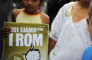 Mädchen mit Transpi 'I am Rom'