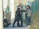 Police arrest migrants in Calais