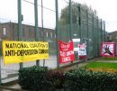 banners on the razorwire fence